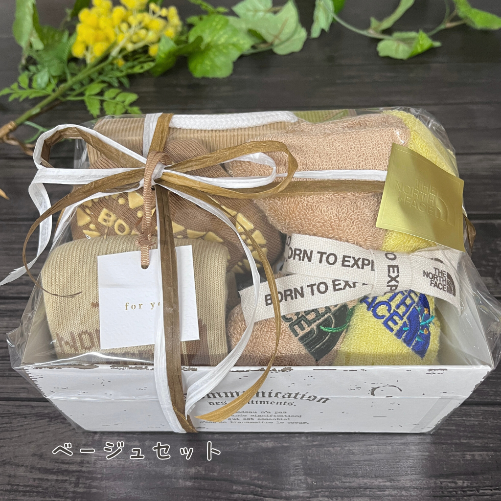 【レッグウォーマー・ソックス・タオルのギフトセット】ザ・ノース・フェイス　ヌプシレッグウォーマー・ソックス&ネイチャーダイハンドタオルセット
